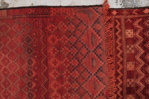 Authentic vintage Zemmour Moroccan rug in a rich raspberry color packed with many intricate motifs 