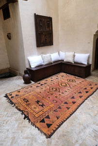 Large warm toned terracotta Vintage Boujad Moroccan rug with black and ochre motifs