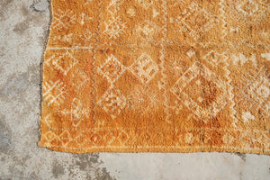 Henna dyed vintage Moroccan rug with white motifs