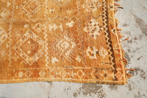 Henna dyed vintage Moroccan rug with white motifs