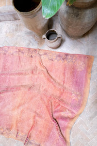 Handwoven vintage Moroccan rug with a beautiful palette of peach and pink