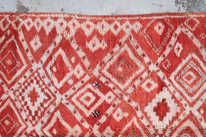 Authentic vintage Moroccan rug low pile cherry red with white colored tribal motifs