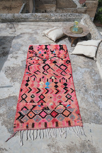 Small pink Boujad Moroccan rug with abstract patterns