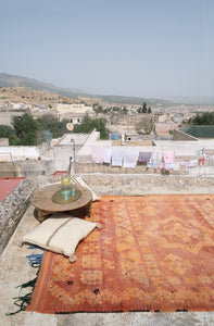 Low pile handwoven vintage Moroccan rug with a beautiful palette of terracotta and ochre