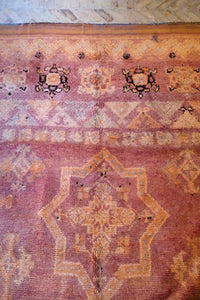 Low pile handwoven vintage Moroccan rug with a beautiful palette of terracotta and ochre